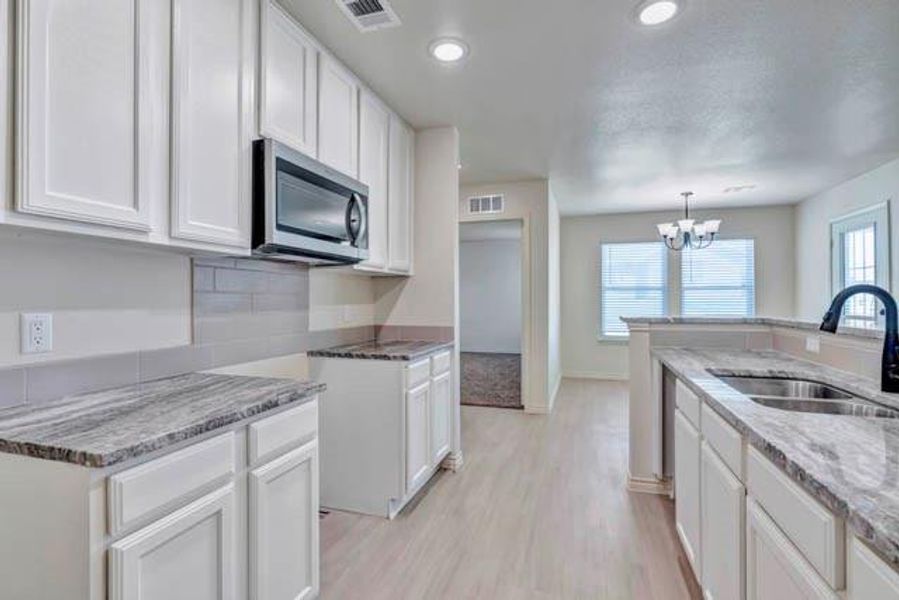 Furnished interior view inside a new home in , Fort Worth (Image 11).