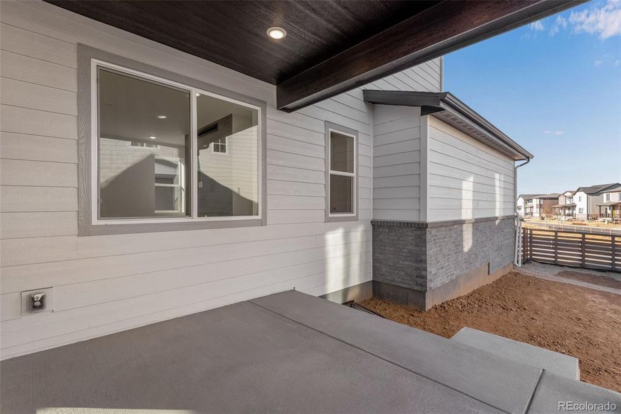 Exterior details and patio area of a home in Painted Prairie, Aurora (Image 4). Exterior details and patio area of a home in Painted Prairie, Aurora (Image 4).