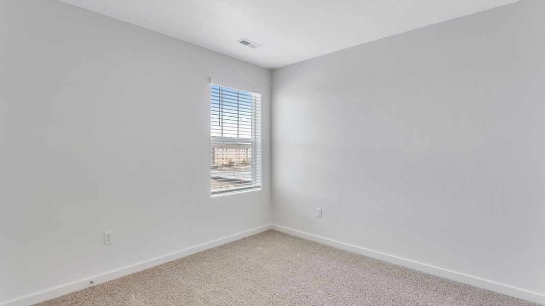 Representative unfurnished interior of a home built from the Juniper by D.R. Horton in Ellston Park, Colorado Springs (Image 26).