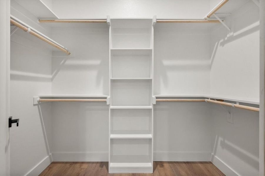 Spacious walk-in master closet Spacious walk-in master closet