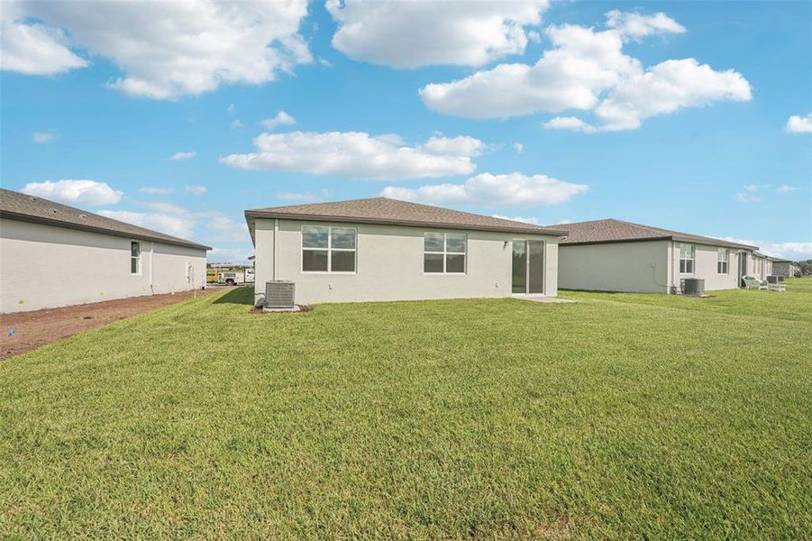 Front exterior of a new home in Salt Meadows - Classic Series, Parrish, FL, highlighting curb appeal (Image 13). Front exterior of a new home in Salt Meadows - Classic Series, Parrish, FL, highlighting curb appeal (Image 13).