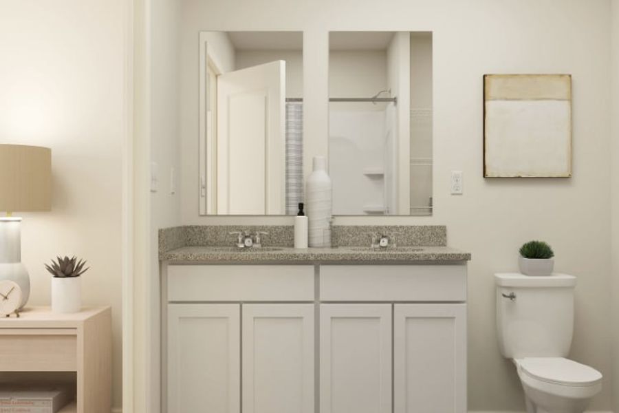 A bathroom with a sink and a toilet.