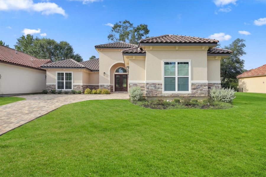 Front exterior of a new home in , Houston, TX, highlighting curb appeal (Image 17).
