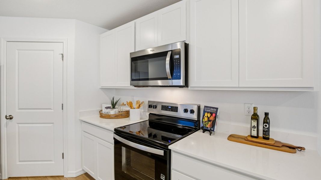 Furnished interior view inside a new home in Angeline, Land O' Lakes (Image 16).