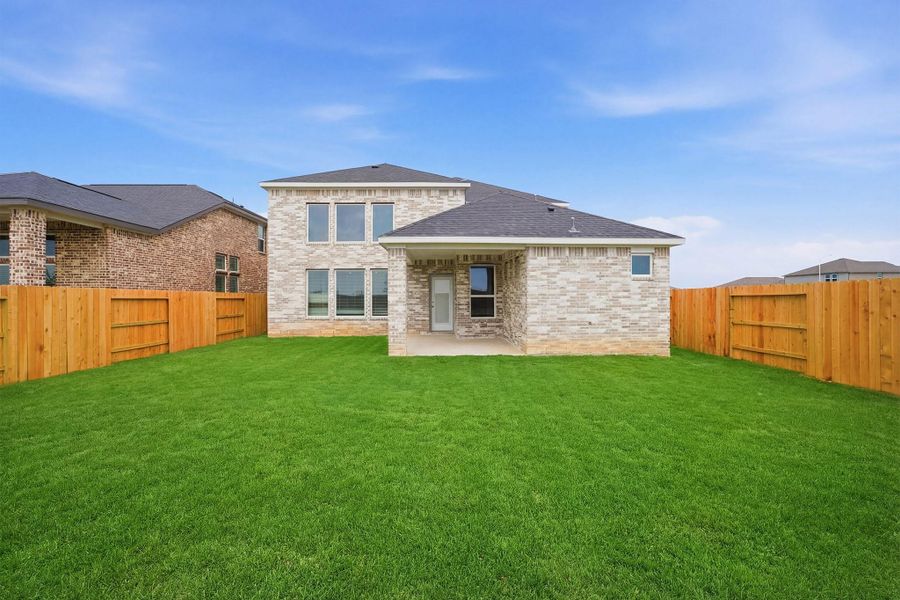 Exterior details and patio area of a home in Sunterra Lakes, Brookshire (Image 3). Exterior details and patio area of a home in Sunterra Lakes, Brookshire (Image 3).