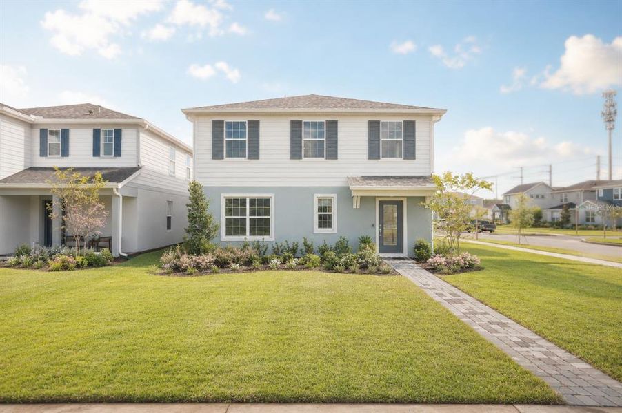 Front exterior of a new home in EverBe, Orlando, FL, highlighting curb appeal (Image 18). Front exterior of a new home in EverBe, Orlando, FL, highlighting curb appeal (Image 18).