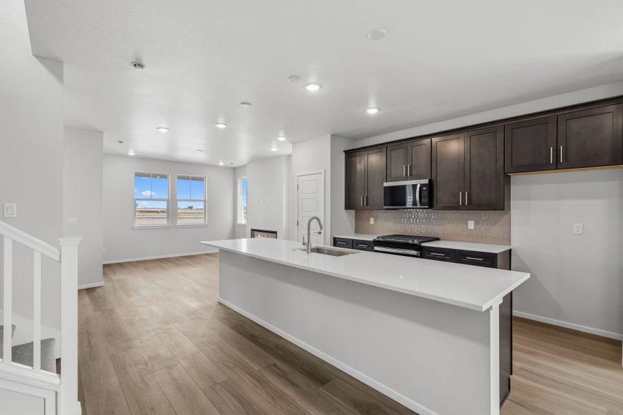 Furnished interior view inside a new home in Barefoot Village, Firestone (Image 12).
