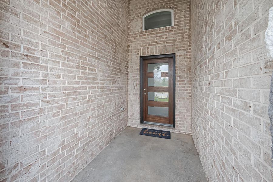 Exterior details and patio area of a home in La Segarra, Brookshire (Image 3).