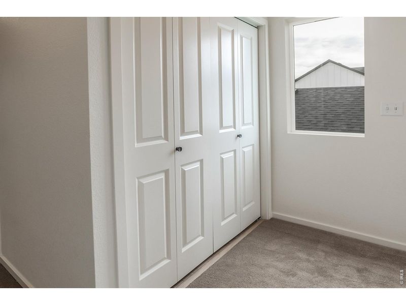 Spacious, unfurnished interior of a new home in Bloom Trailblazer Collection - Single Family Homes, Fort Collins (Image 31).