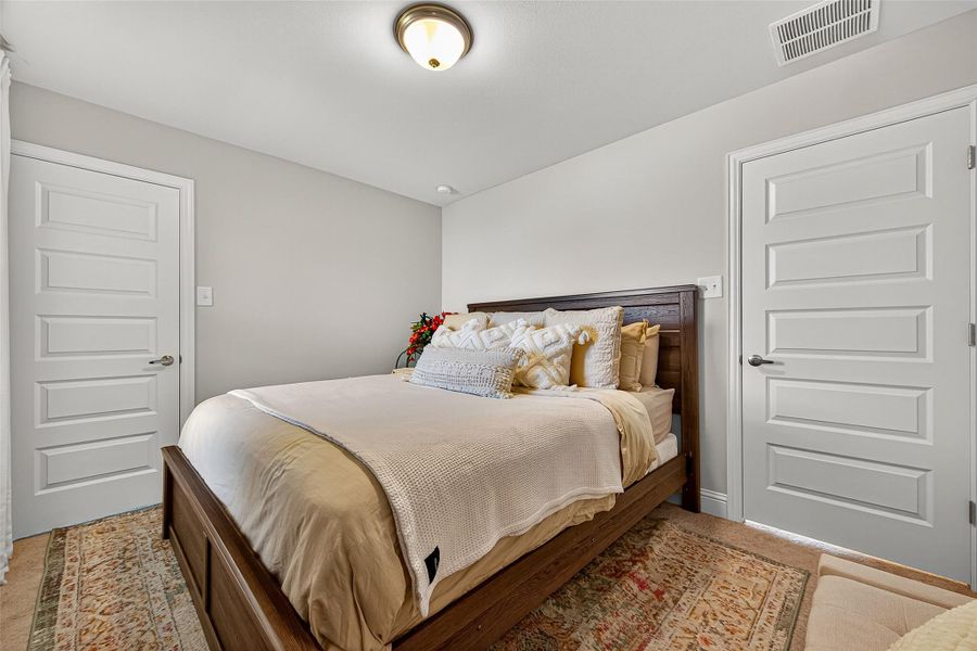 Furnished interior view inside a new home in Sunterra, Katy (Image 12).