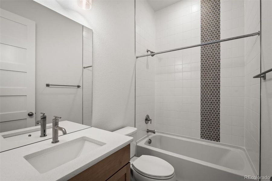 Furnished interior view inside a new home in Cloverleaf - Pinnacle Collection, Monument (Image 9).