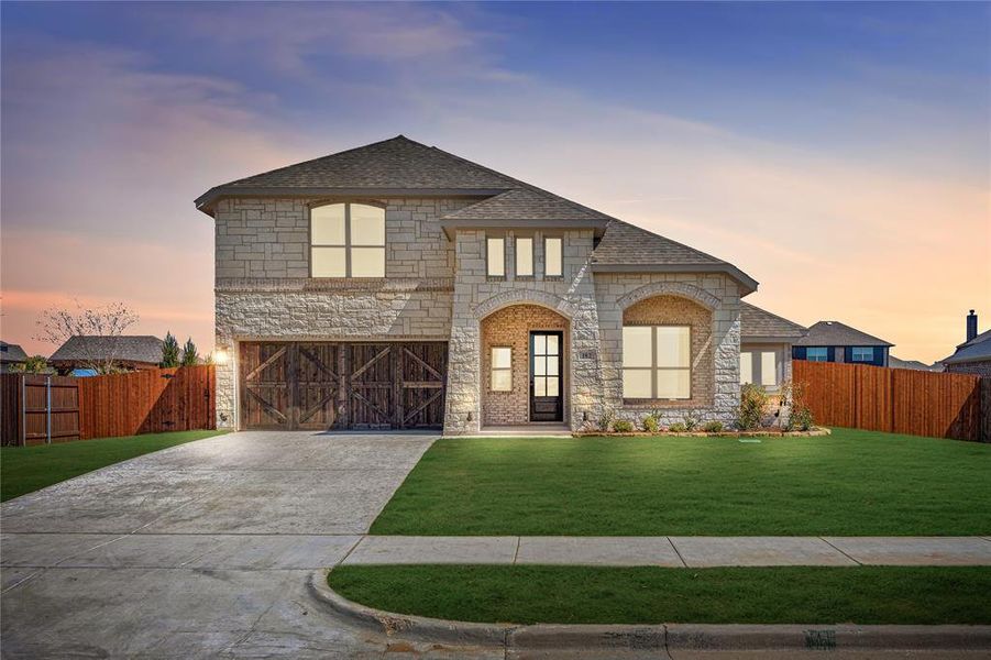 Front exterior of a new home in Sunrise at Garden Valley, Waxahachie, TX, highlighting curb appeal (Image 2).