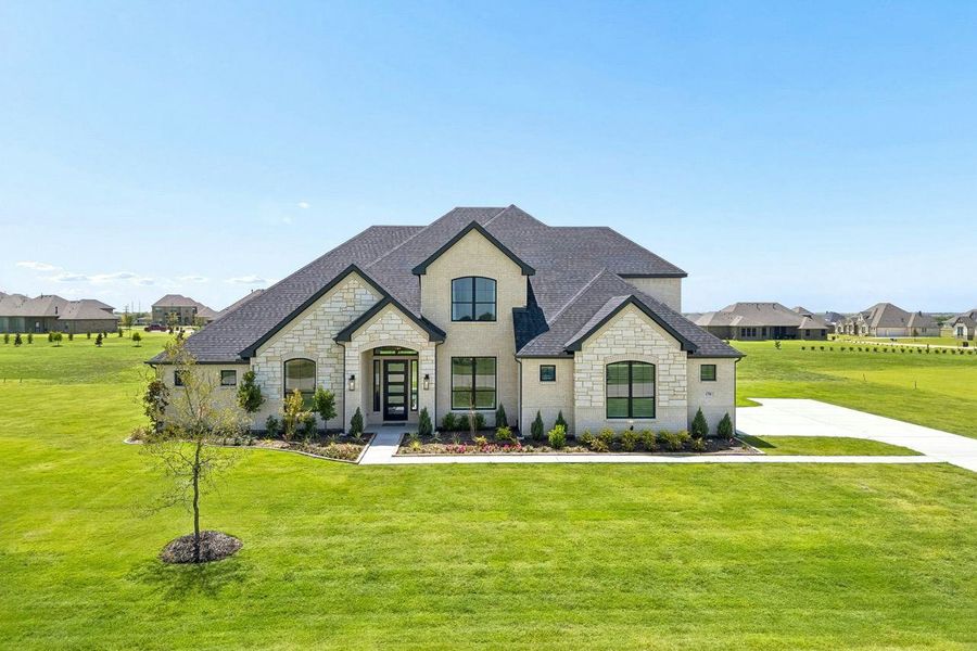 Representative exterior photo of a completed home built from the Dickson by Kindred Homes in Oak Creek Ranch, Waxahachie, TX (Image 26).