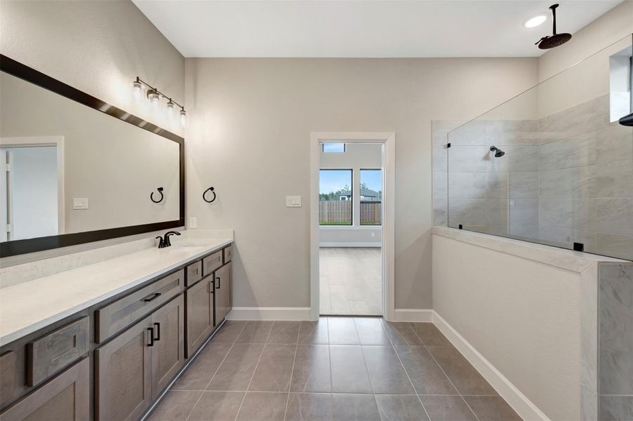 Furnished interior view inside a new home in COLTON - Reserve Collection, Todd Mission (Image 18).