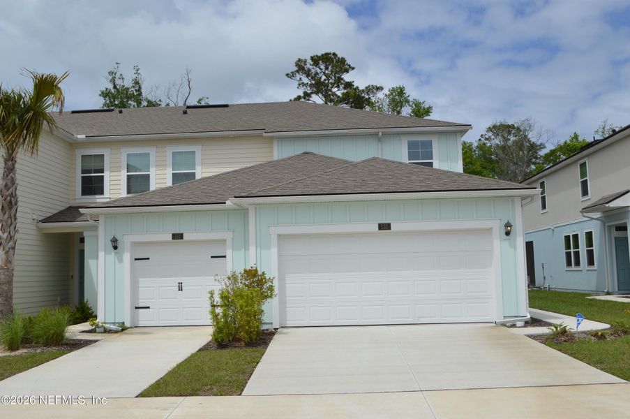 Front exterior of a new home in , St. Augustine, FL, highlighting curb appeal (Image 15).