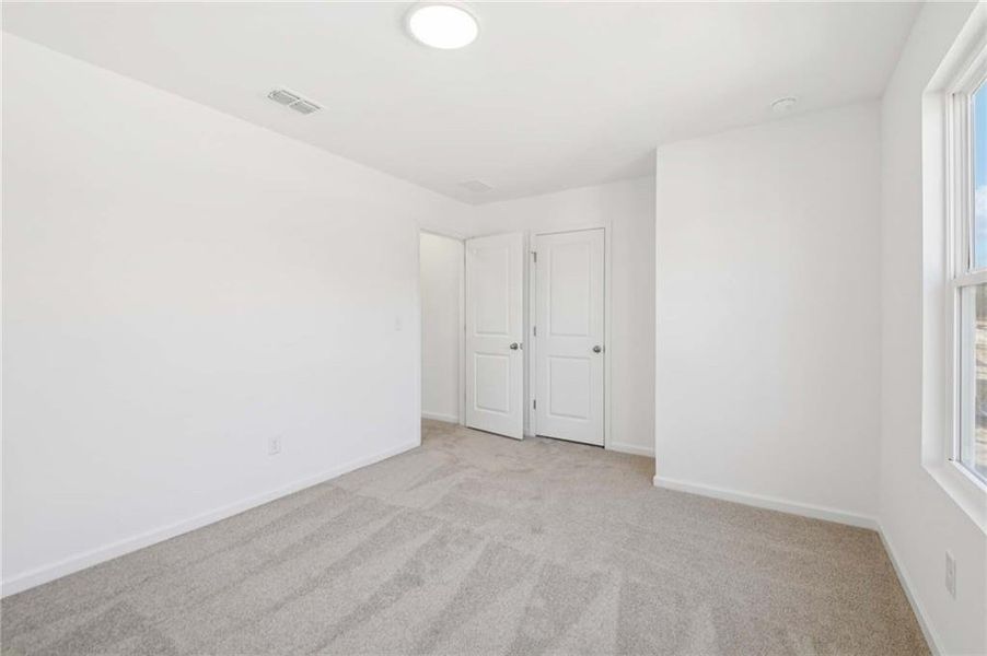 Spacious, unfurnished interior of a new home in The Pointe at Heron Bay, Locust Grove (Image 29).