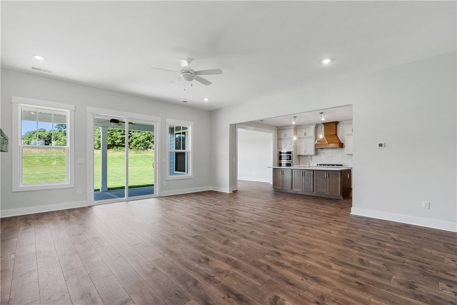 A spacious living area flows seamlessly into the k