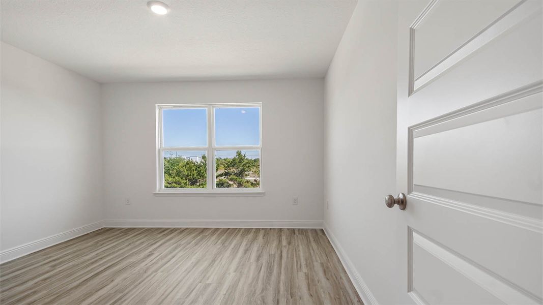 Spacious, unfurnished interior of a new home in WindMark Beach, Port Saint Joe (Image 33).