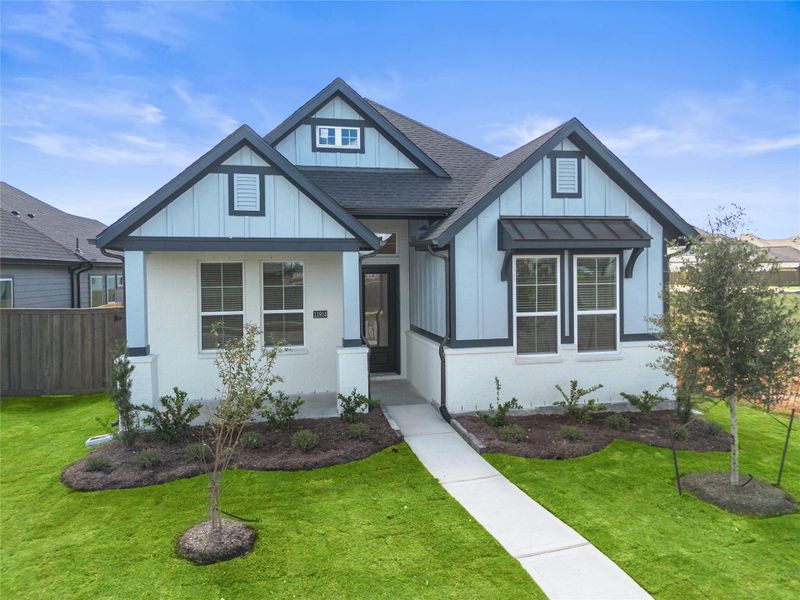 Front exterior of a new home in Riceland, Mont Belvieu, TX, highlighting curb appeal (Image 21).
