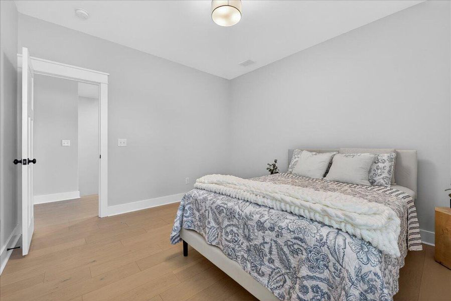Furnished interior view inside a new home in Tidewater at Lakes of Cane Bay, Summerville (Image 16).