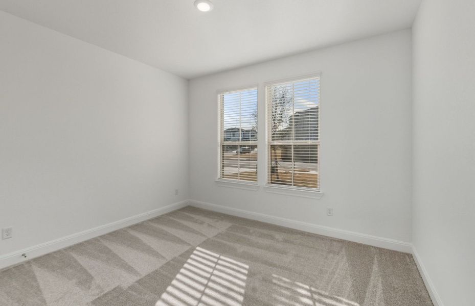 Spacious, unfurnished interior of a new home in Saddleback at Santa Rita Ranch, Liberty Hill (Image 52).
