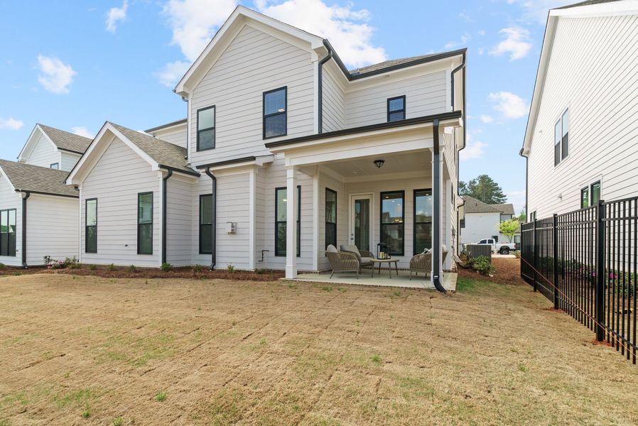 Representative exterior photo of a completed home built from the The Bullard by The Providence Group in Promenade at Sawnee Village, Cumming, GA (Image 23).