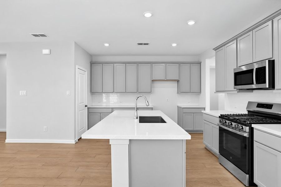 Furnished interior view inside a new home in Avalon at Cypress, Cypress (Image 9).
