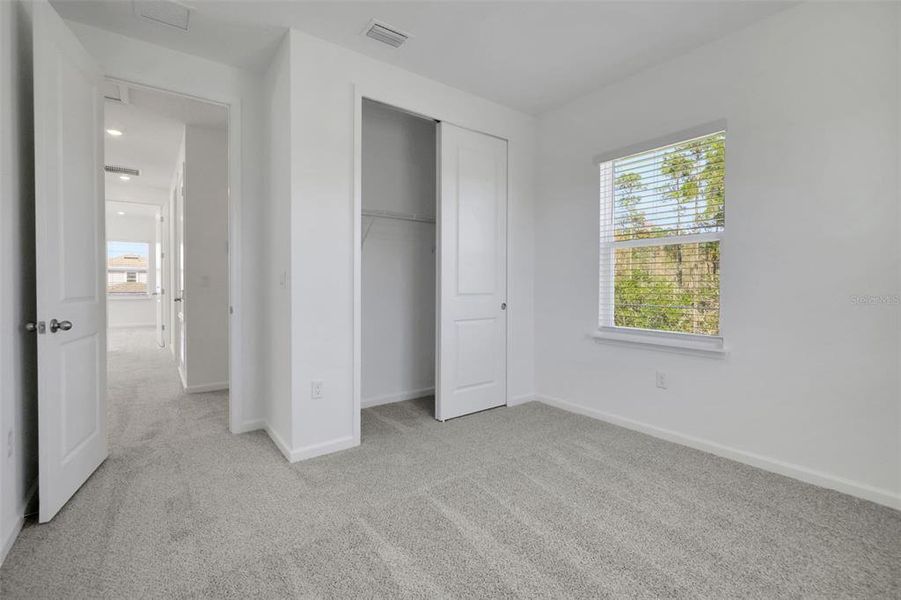 Spacious, unfurnished interior of a new home in Serenade at Ovation, Winter Garden (Image 28).