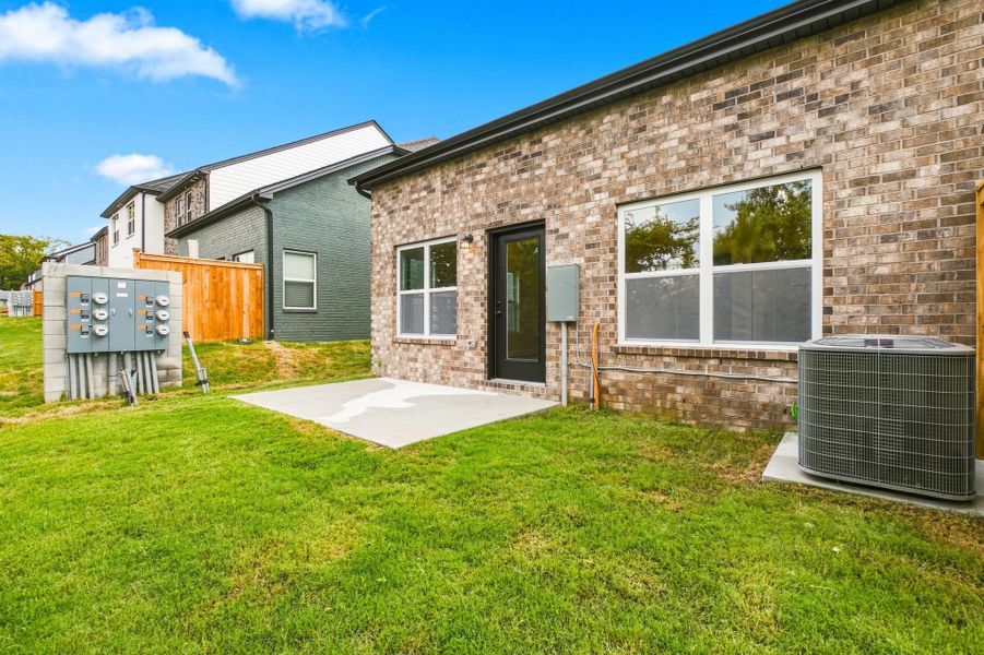 Back Patio and Yard at Oxford Station Townhome