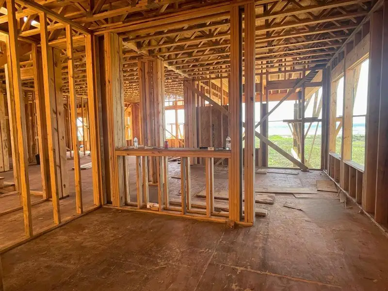 Looking out towards the dining room and beach views from the kitchen. Looking out towards the dining room and beach views from the kitchen.