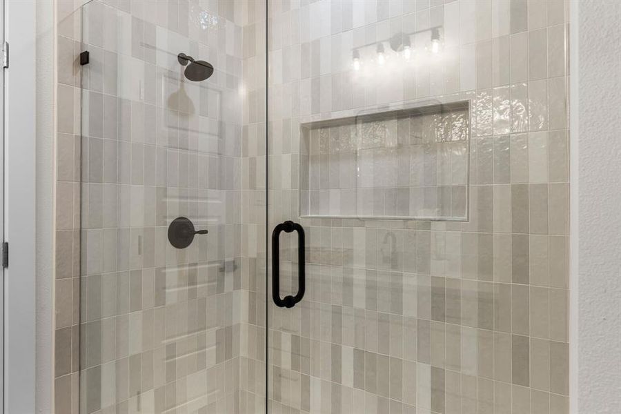 Bathroom featuring a shower stall