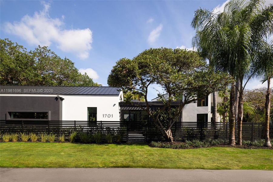 Front exterior of a new home in , Miami, FL, highlighting curb appeal (Image 22).