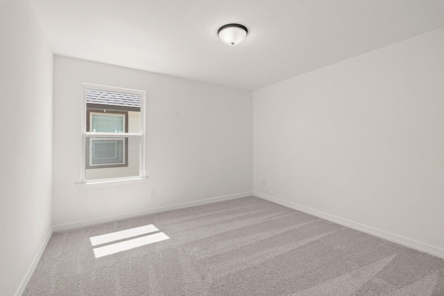 Your secondary bedroom features plush carpet, fresh paint, closet, and a large window that lets in plenty of natural lighting. Your secondary bedroom features plush carpet, fresh paint, closet, and a large window that lets in plenty of natural lighting.
