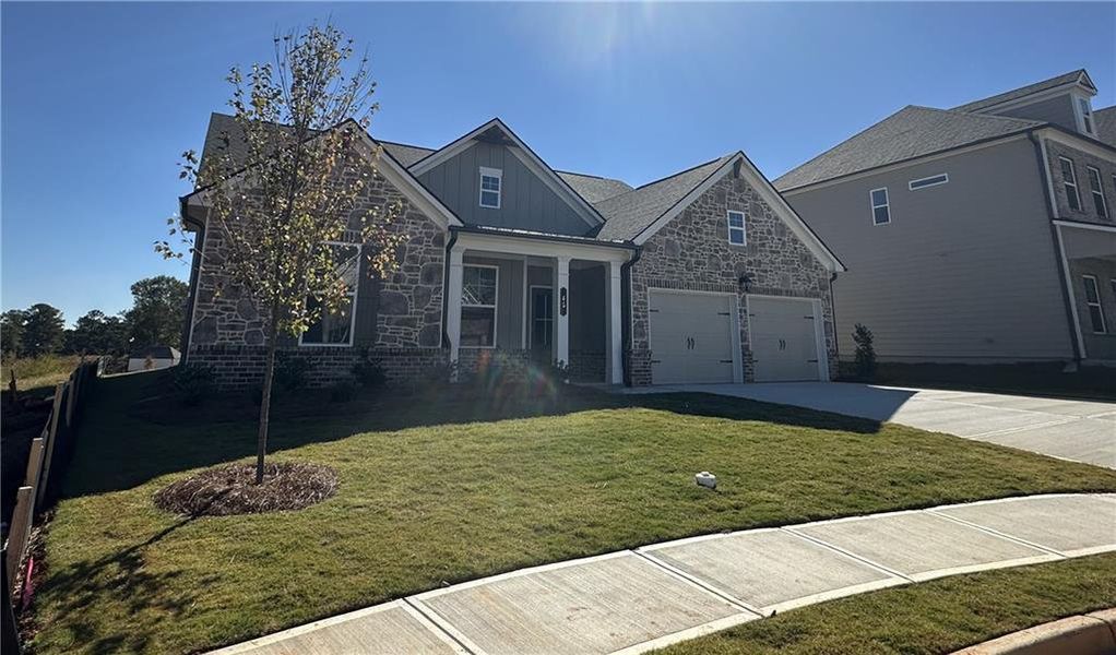 Front exterior of a new home in Summerlin, Winder, GA, highlighting curb appeal (Image 32).
