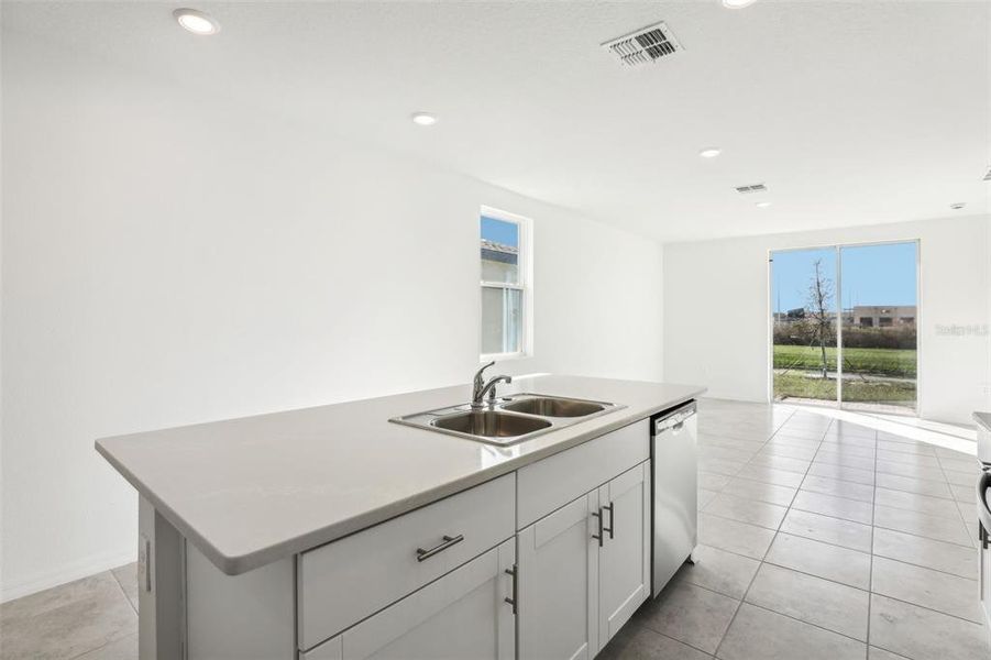 Furnished interior view inside a new home in Lake Deer Estates - Classic Series, Poinciana (Image 8).