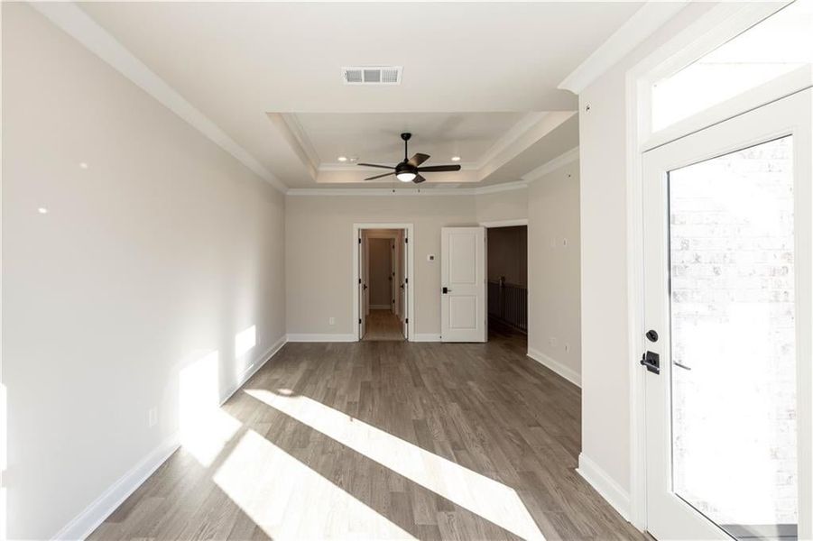 his expansive primary bedroom includes a charming sunroom extension—ideal as a reading nook, lounge, or peaceful hideaway. With generous square footage and serene views, it’s a true owner’s retreat that blends indoor comfort with outdoor ambiance. These his expansive primary bedroom includes a charming sunroom extension—ideal as a reading nook, lounge, or peaceful hideaway. With generous square footage and serene views, it’s a true owner’s retreat that blends indoor comfort with outdoor ambiance. These