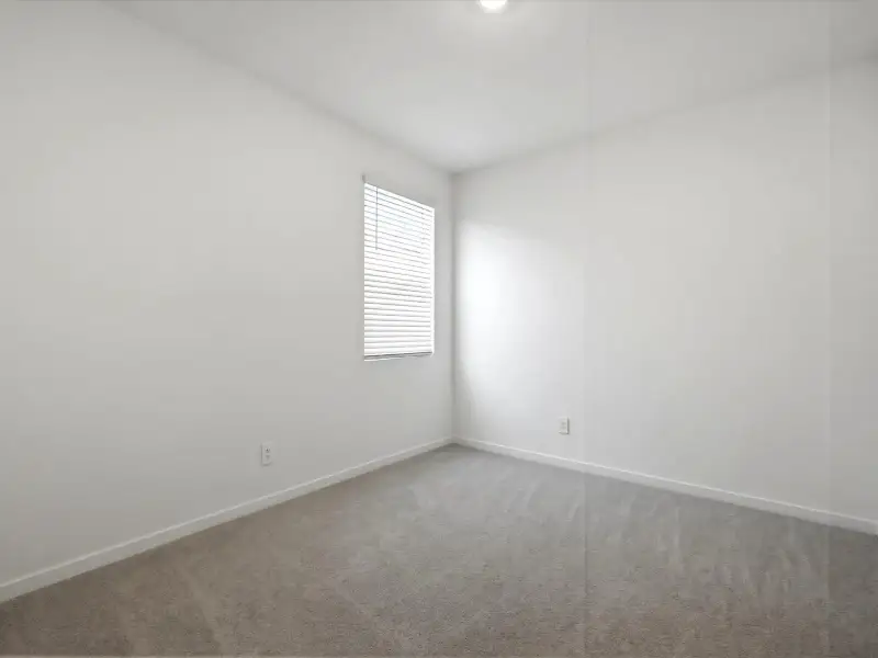 Spacious, unfurnished interior of a new home in Rancho Mirage Estate Series, Maricopa (Image 13).