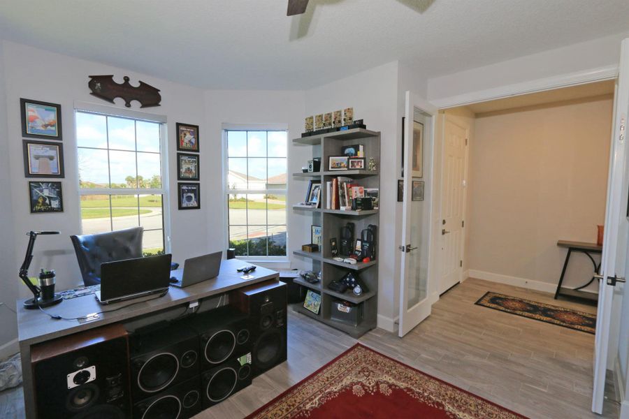 Furnished interior view inside a new home in Del Webb Tradition, Port St. Lucie (Image 29).