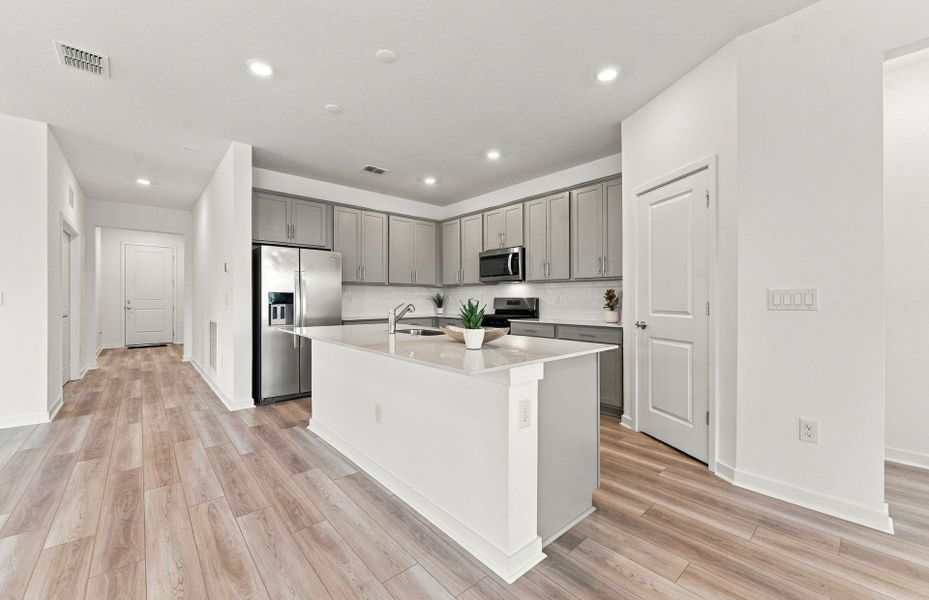 Furnished interior view inside a new home in Oakfield Trails, Parrish (Image 6).