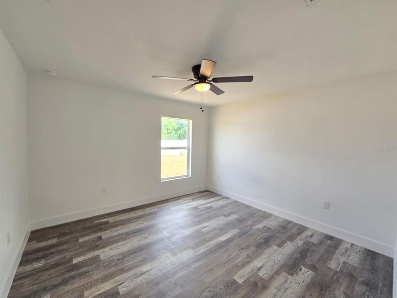 Spacious, unfurnished interior of a new home in , Port Charlotte (Image 26).