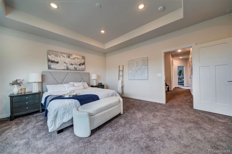 King bed and nightstands easily fit in the primary bedroom.