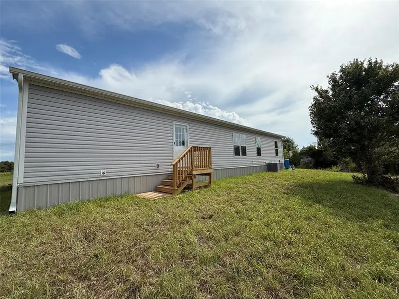 Exterior details and patio area of a home in , Okeechobee (Image 2). Exterior details and patio area of a home in , Okeechobee (Image 2).
