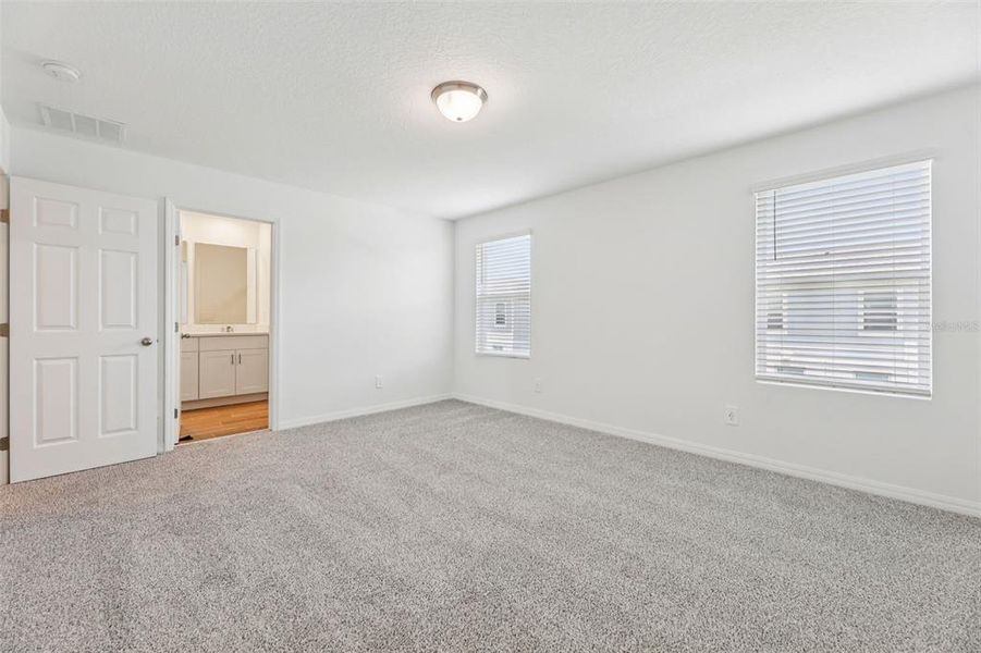 Spacious, unfurnished interior of a new home in The Meadow at Crossprairie Townes, St. Cloud (Image 19).