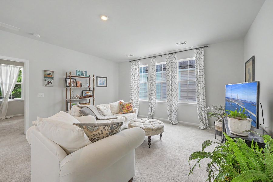 Furnished interior view inside a new home in Limehouse Village: Row Collection, Summerville (Image 17).