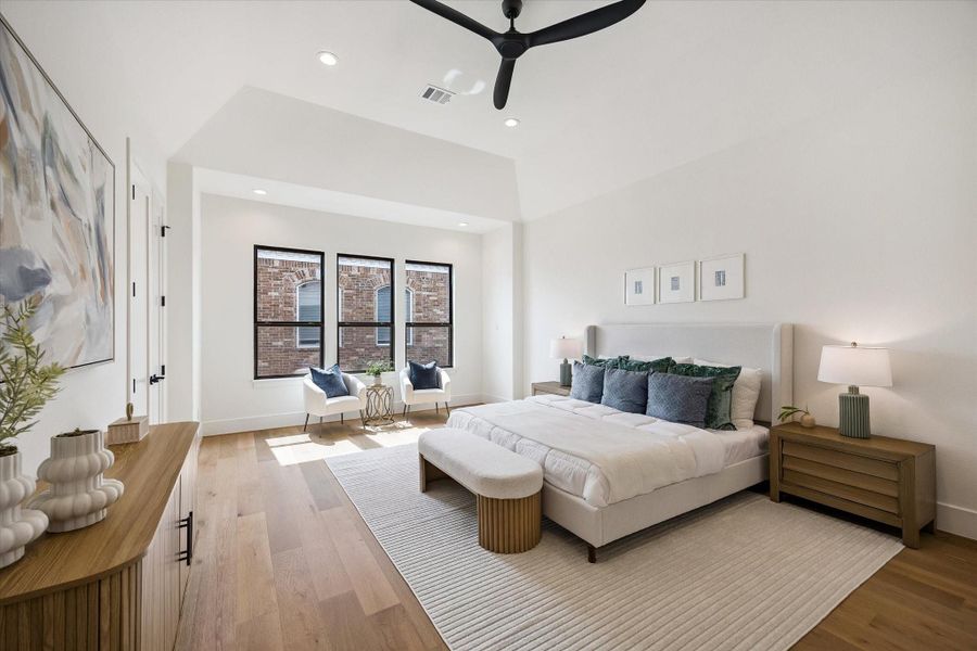 Primary suite - offers raised ceiling, ceiling fan and wood flooring. Primary suite - offers raised ceiling, ceiling fan and wood flooring.