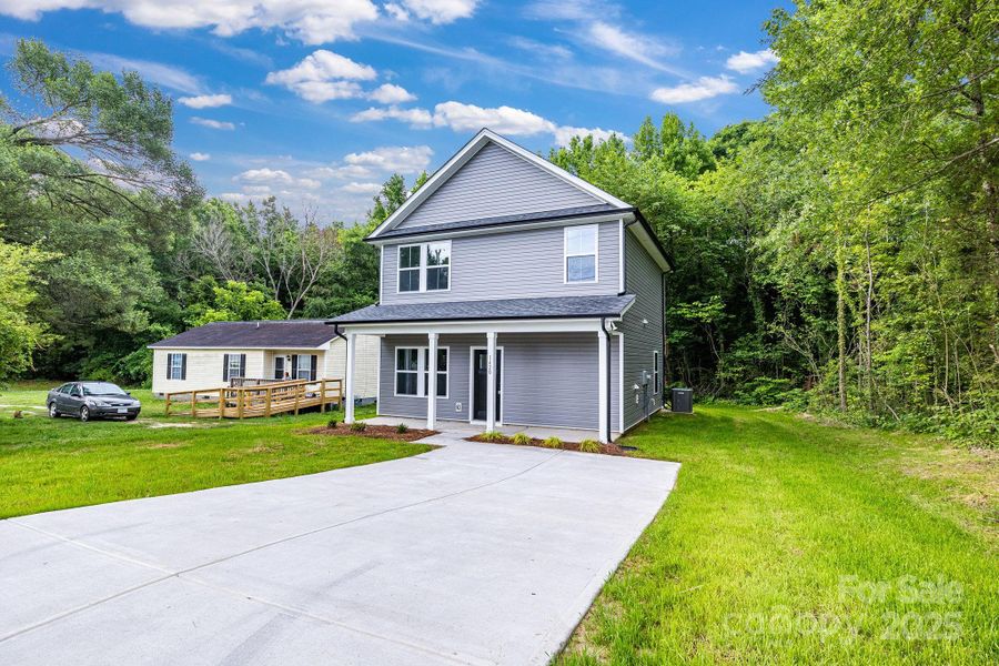 Front exterior of a new home in , Kannapolis, NC, highlighting curb appeal (Image 15).