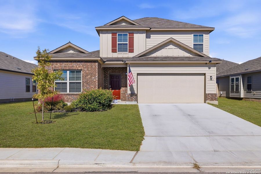 Front exterior of a new home in Greenspoint Heights, Seguin, TX, highlighting curb appeal (Image 2).