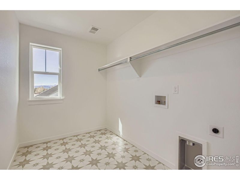 Spacious, unfurnished interior of a new home in RainDance - 60s, Windsor (Image 13).