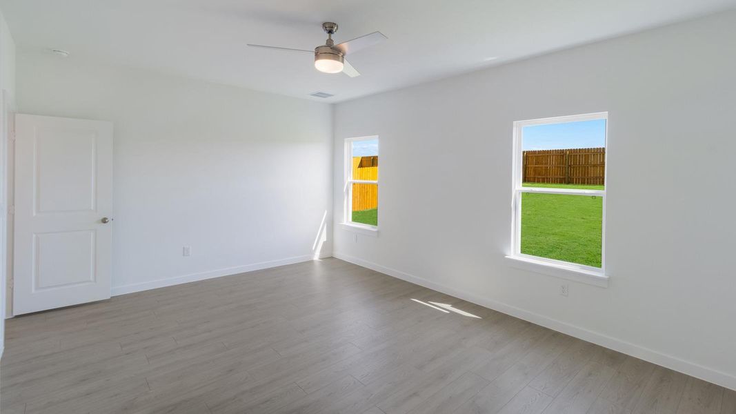 Spacious, unfurnished interior of a new home in Trails at Wildhorse, Austin (Image 12).