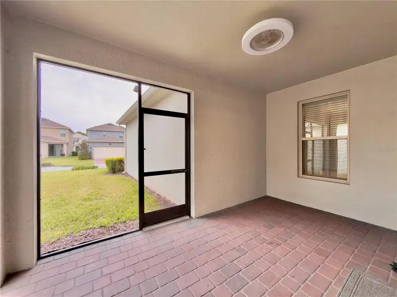 Exterior details and patio area of a home in Waterleigh, Winter Garden (Image 3). Exterior details and patio area of a home in Waterleigh, Winter Garden (Image 3).